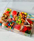 a plastic container filled with lots of candy