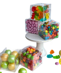 three plastic containers filled with candy and candies