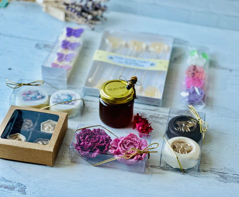 a table topped with lots of different types of items