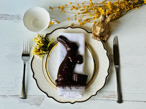 a plate with a chocolate bunny on it