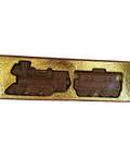 two chocolate trains in a red and gold box